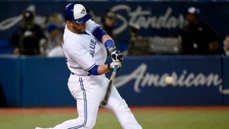 Toronto Blue Jays catcher Russell Martin hits a solo home run in the eighth inning against the Tampa Bay Rays, giving Toronto a 7-6 victory. martin-russell