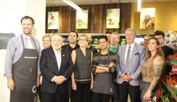 Kathleen Wynne in group pictures at The Mustard Seed