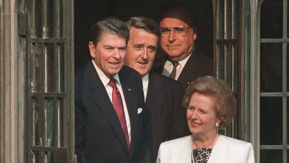 Ronald Reagan, Brian Mulroney and Helmut Kohl follow Margaret Thatcher into a courtyard at Hart House in Toronto, June 20, 1988.