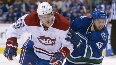 The Montreal Canadiens traded defenceman Nathan Beaulieu, left, to the Buffalo Sabres on Saturday in exchange for a third-round pick in the 2017 NHL Entry Draft. HKN Canadiens Sabres Trade 20170617