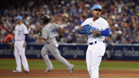 Toronto Blue Jays starting pitcher Marcus Stroman looks on as Chicago White Sox first baseman Jose Abreu rounds the bases after hitting a solo home run in the sixth inning in Toronto on Saturday. blue-jays-white-sox-061717-620
