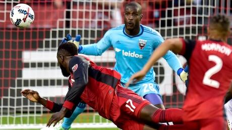 Jozy Altidore of Toronto FC attempts a diving header on D.C. United goalkeeper Bill Hamid, during MLS action on Saturday. TFC-DCU-17062017