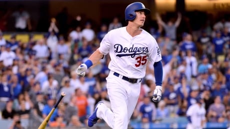 Cody Bellinger hit two home runs in his first two at-bats of Monday night's game against the New York Mets to become the fastest player to 21 home runs in baseball history. cody-bellinger