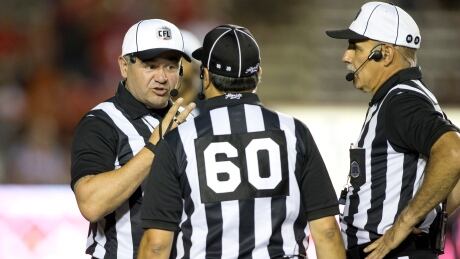 Brian Chrupalo, left, has been a CFL official for 11 seasons, and is also a member of the Winnipeg police force. Brian-chrupalo