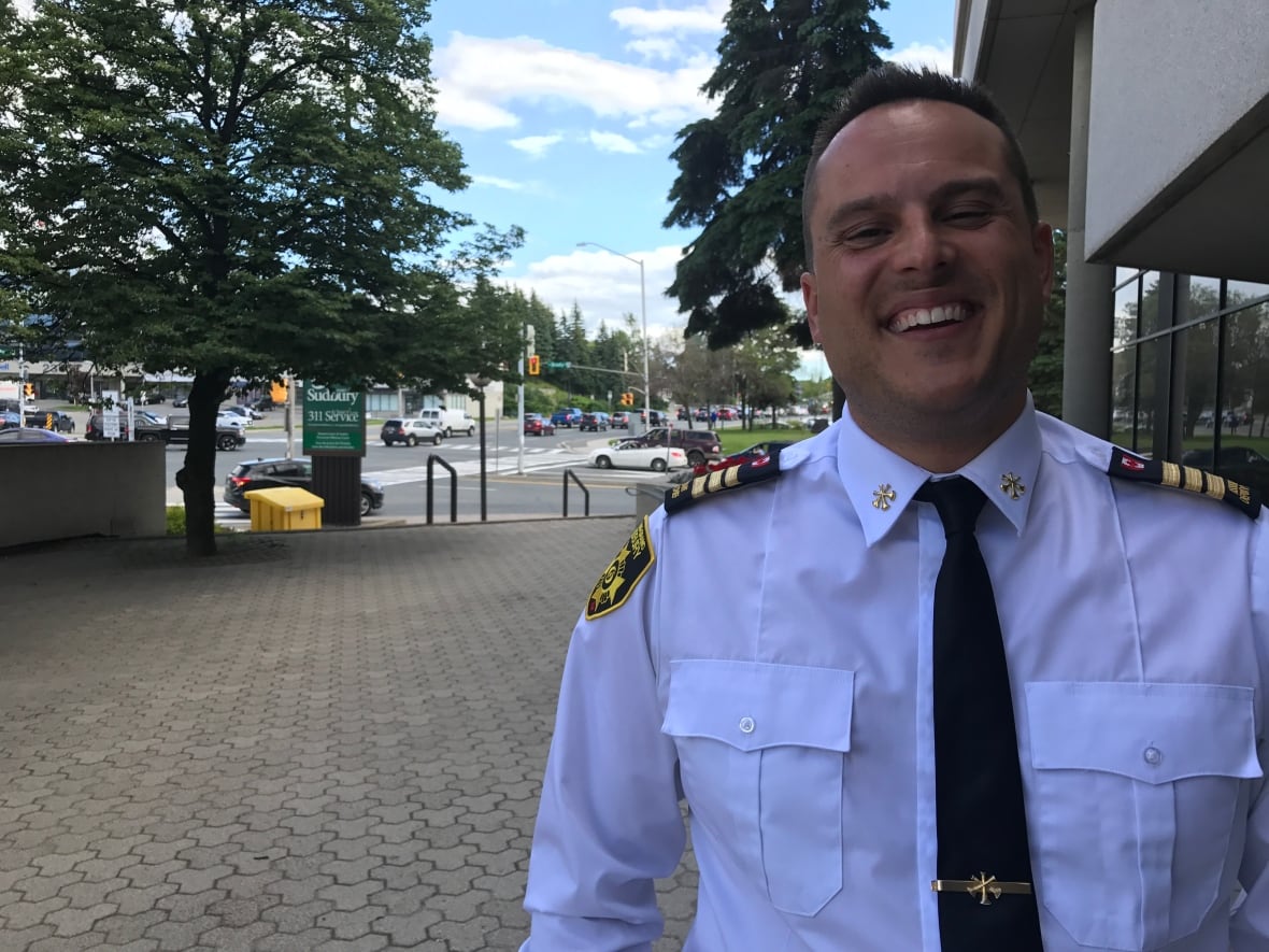 Man in fire services uniform.