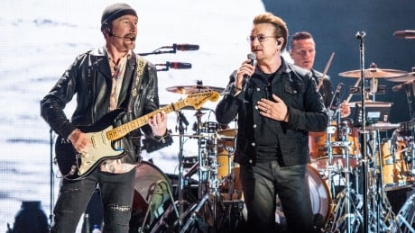 The Edge, left, and Bono of U2 perform at the Bonnaroo Music and Arts Festival earlier this month. The pair will appear on Parliament Hill on Canada Day, although it's not clear if they'll perform. U2 Bono The Edge