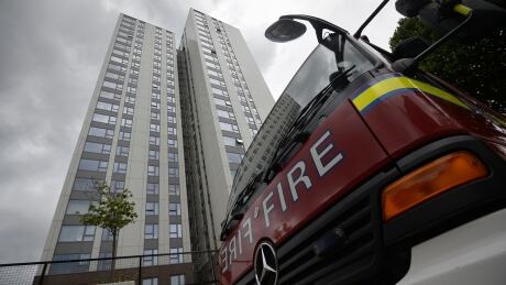 A fire engine is parked outside the Burnham Tower residential block, as residents were evacuated as a precautionary measure following concerns over the type of cladding used on the outside of the buildings on the Chalcots Estate in north London, Britain, June 24, 2017. BRITAIN-FIRE/