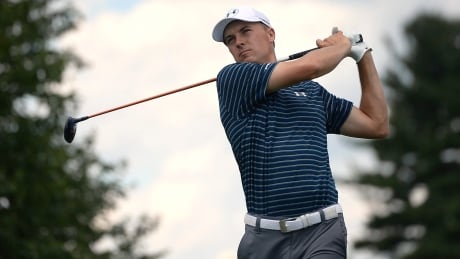 Jordan Spieth tees off the second hole during the final round of the Travelers Championship golf tournament on Sunday. spieth-jordan