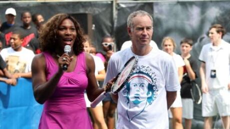 Former tennis great John McEnroe, right, said Serena Williams, left, would be ranked "like 700" if she played on the men's tour. mcenroe-john-williams-serena-062617