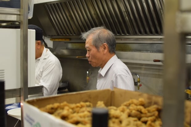 Sam Yuen in the kitchen at Odd Couple.