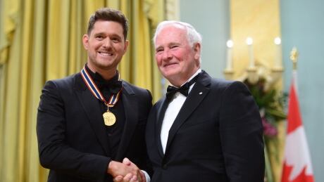 Governor General David Johnston presents Michael Buble with the National Arts Centre Award during the Governor General's Performing Arts Awards ceremony at Rideau Hall in Ottawa on Wednesday. Performing Art Awards 20170628