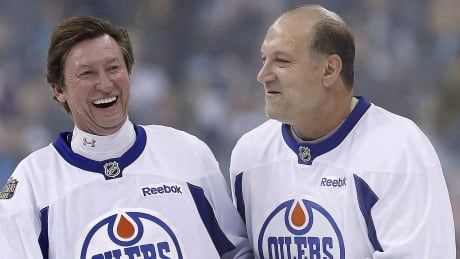 Former Oilers tough guy Dave Semenko, right, has died from cancer at age 59. The Winnipeg native is best known for his role as bodyguard for the NHL's all-time leading scorer, Wayne Gretzky, left. semenko-dave-1180