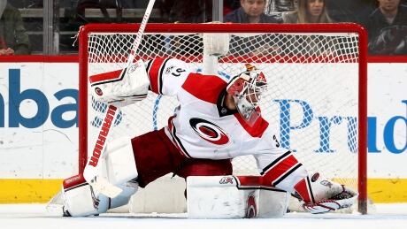 The Calgary Flames have reportedly acquired goaltender Eddie Lack, above, and defenceman Ryan Murphy from the Carolina Hurricanes. 95097133