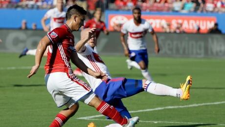 FC Dallas midfielder Mauro Diaz keeps the ball away from TFC's Michael Bradley during Toronto's 3-1 loss on Saturday in Frisco, Texas. TFC-Dallas-01072017