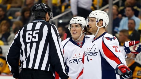 Karl Alzner, right, seen arguing with an official, in this file photo from 2016, alongside former Washington Capitals' teammate T.J. Oshie was acquired on Saturday by the Montreal Canadiens. Alzner-Karl-13102016