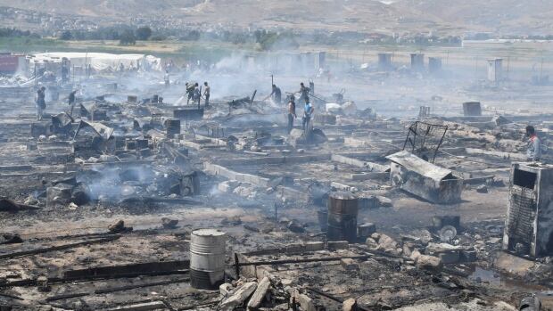 Fire rages in Syrian refugee camp in Lebanon, 1 dead