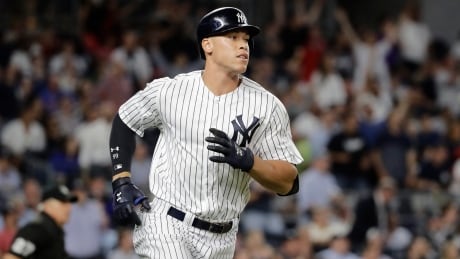 New York Yankees' Aaron Judge runs the bases after hitting a home run against the Los Angeles Angels in a baseball game in New York. judge-aaron