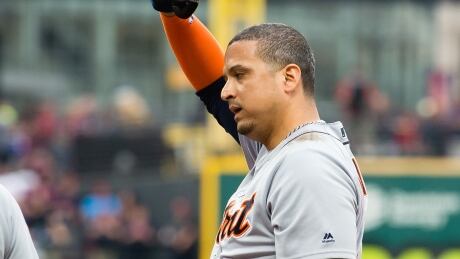Victor Martinez of the Detroit Tigers waves after receiving a standing ovation from the crowd in Cleveland in celebration of his 2,000th career hit on Friday. Martinez-Victor-07072017
