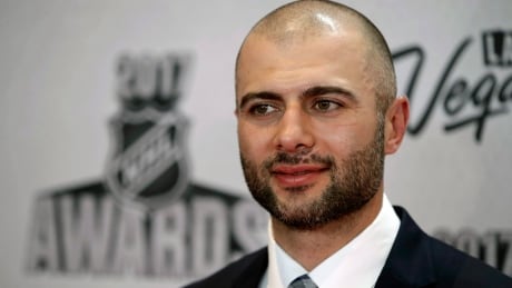 The Calgary Flames' Mark Giordano poses before the NHL Awards on June 21, 2017, in Las Vegas. On Tuesday, he received the the newly named Muhammad Ali Sports Humanitarian Award at a ceremony in L.A. NHL Awards