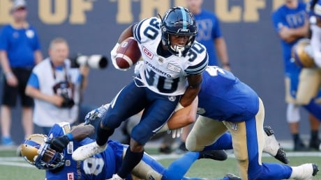 Toronto Argonauts' Martese Jackson (30) returns a Winnipeg Blue Bombers' kickoff for a touchdown, but the score was called back due to a flag on the play during the first half in Winnipeg on Thursday. jackson-martese-071317-620