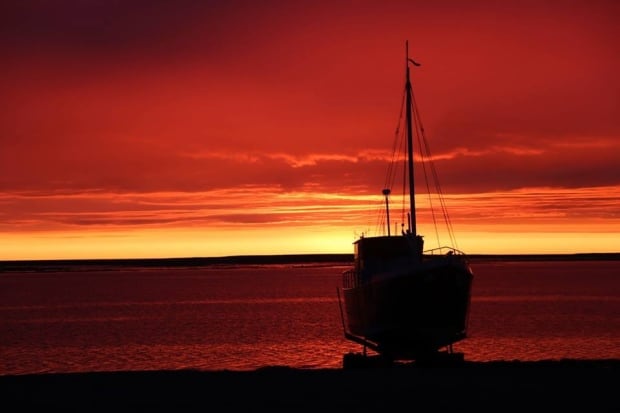 Arviat sailboat in the sunrise