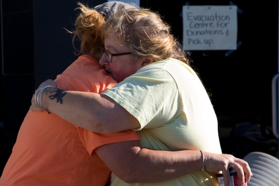 BC Wildfire Kelly Kennedy hugs friend evacuation centre