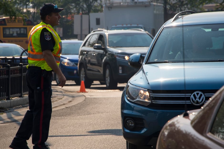 BC Wildfire Evacuation Centre Emergency Services Line Up Cars