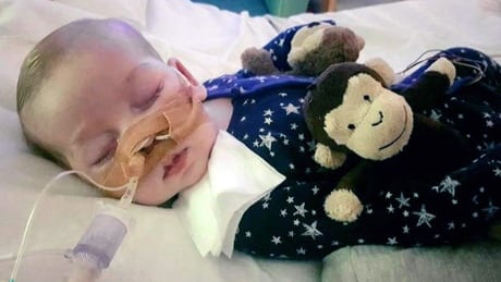 This is an undated photo of sick baby Charlie Gard provided by his family, taken at Great Ormond Street Hospital in London. A British court will assess new evidence Monday July 10, 2017, in the case of 11-month-old Charlie Gard as his mother pleaded with judges to allow the terminally ill infant to receive experimental treatment for his rare genetic disease, mitochondrial depletion syndrome. Britain Sick Baby