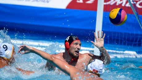 Canadian Nicolas Constantin-Bicari challenges for the ball during the team's 8-8 tie with Montenegro. constantin-bicari-nicolas-071717