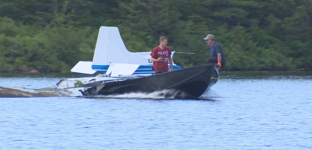 Crashed plane wreckage on boat Paddy's Pond