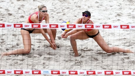 Sarah Pavan, left, and Melissa Humana-Paredes, seen above competing earlier this season, fell to Brazil in the gold-medal match at the Olsztyn Open on Sunday. pavan-humana-paredes-052117-620