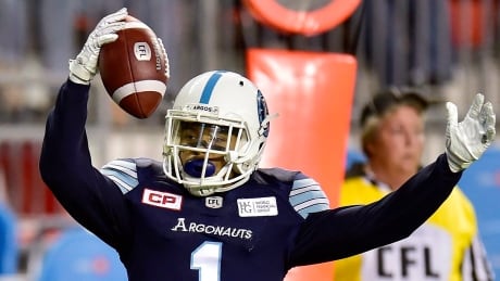 Toronto Argonauts running back Anthony Coombs (1) celebrates his touchdown during the second half. redblacks-argos