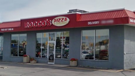 A woman went into Rocco's Pizzeria on Sunday night and used children as a distraction so she could steal a number of pre-made pizzas. Rocco's Pizzeria