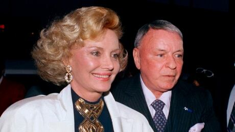 FILE - In this July 12, 1988 file photo Frank Sinatra and his wife Barbara appear at Milton Berle's 80th birthday party in Los Angeles. Barbara Sinatra, a prominent advocate and philanthropist for abused children, died Tuesday, July 25, 2017, of natural causes at her Rancho Mirage, California, home. She was 90. (AP Photo/File) Obit Barbara Sinatra