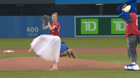 Heather Ogden throws out the first pitch at the Jays game Tuesday night Heather Ogden