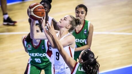 Alyssa Jerome (9) scored 12 points en route to Canada's 64-43 victory over Mexico Wednesday at the FIBA U-19 Women's World Cup. jerome-alyssa-072617