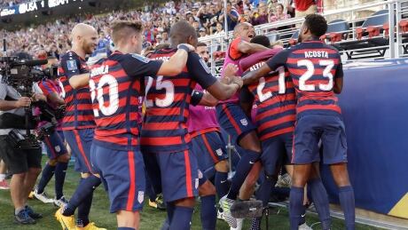 United States players celebrate after Jozy Altidore (27) scored a goal during the first half of the Gold Cup final against Jamaica. gold-cup