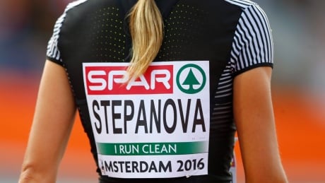 Russian athlete Yuliya Stepanova, who provided evidence of widespread doping in the Russian track and field federation, wears a bib emblazoned with the anti-doping slogan "I run clean" during a 2016 competition.
IOC Russia