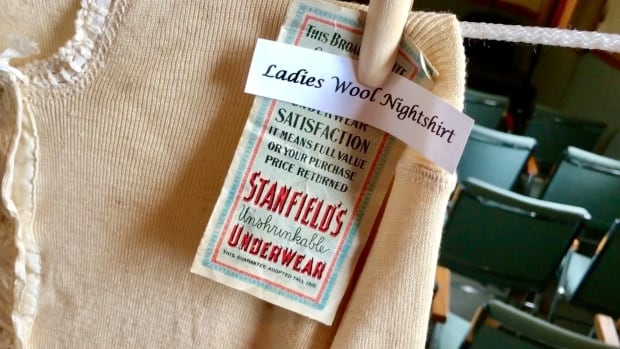 Labels on an old night shirt.