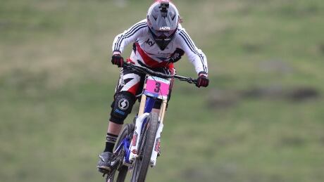 Britain's Manon Carpenter in action during the women's competition to win the Women Elite Downhill class of the 2014 UCI Mountain Bike & Trials World Championships in Hafjell, Norway, Sunday Sept. 7, 2014. (AP Photo/Geir Olsen, NTB Scanpix) NORWAY OUT Norway Mountain Bike & Trials