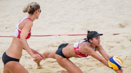 Sarah Pavan, left, and Melissa Humana-Paredes seen in action during the bronze-medal match against Larissa Franca Maestrini and Talita Da Rocha Antunes of Brazil at the Beach Volleyball World Championships in Vienna, Austria on Saturday. pavan-humana-paredes-080517-620