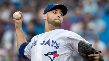 Toronto Blue Jays starting pitcher Marco Estrada throws against the New York Yankees during the first inning in Toronto on Thursday. estrada-marco-081017