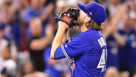 Toronto Blue Jays starting pitcher Chris Rowley reacts after being pulled from the game. pirates-jays