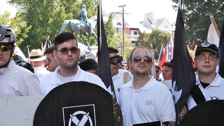 James Alex Fields Jr., second from left, holds a black shield in Charlottesville, Va., where a white nationalist rally took place.