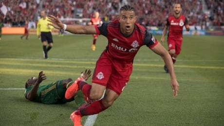 Toronto FC's Justin Morrow celebrates after scoring his team's first goal against the Portland Timbers on Saturday. morrow-justin