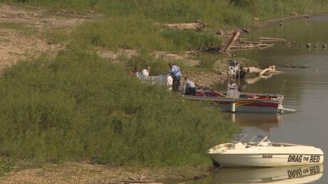 Fire crews and the police river patrol removed a body from the Red River near St. John's Park on Friday morning. Red River Body