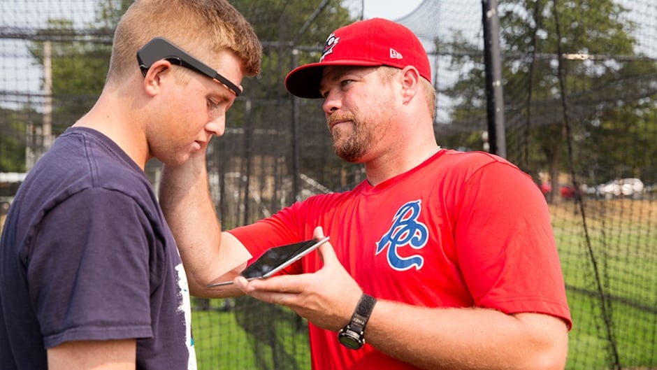 Batter is fitted with a portable EEG device to measure brainwaves.