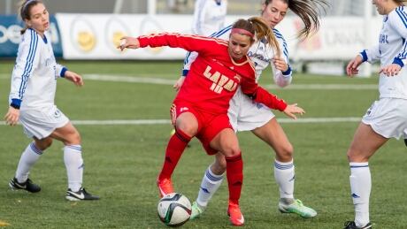 Arielle Roy-Petitclerc, centre, had thought about giving up on soccer after being cut from her provincial team three times as a teenager. arielle-roy-petitclerc
