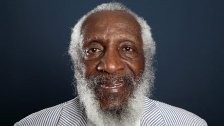 FILE - In this July 21, 2012 file photo, comedian and activist Dick Gregory, from the upcoming documentary film "Soul Food Junkies," poses for a portrait during the PBS TCA Press Tour in Beverly Hills, Calif. A play about Gregory will open off-Broadway this spring starring Joe Morton and with an original song by John Legend. “Turn Me Loose,” by Gretchen Law will play the Westside Theatre starting May 3, 2016, under the direction of John Gould Rubin. Theater-Dick Gregory
