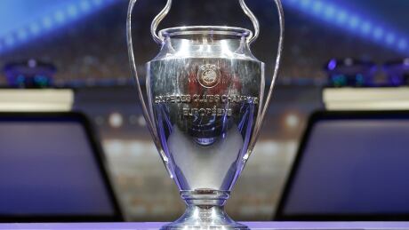 The trophy of UEFA Champions League is put on display before the UEFA Champions League draw in Monaco on Thursday. Monaco Soccer Champions League draw